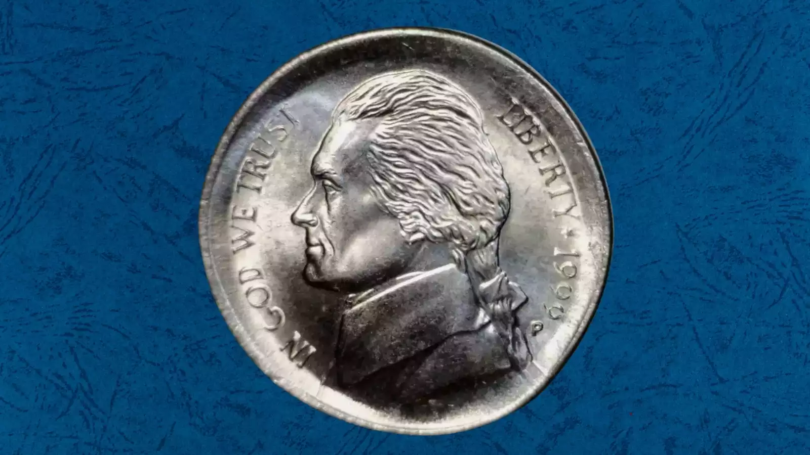 1999 Jefferson nickel broadstrike error showing enlarged diameter from collar failure