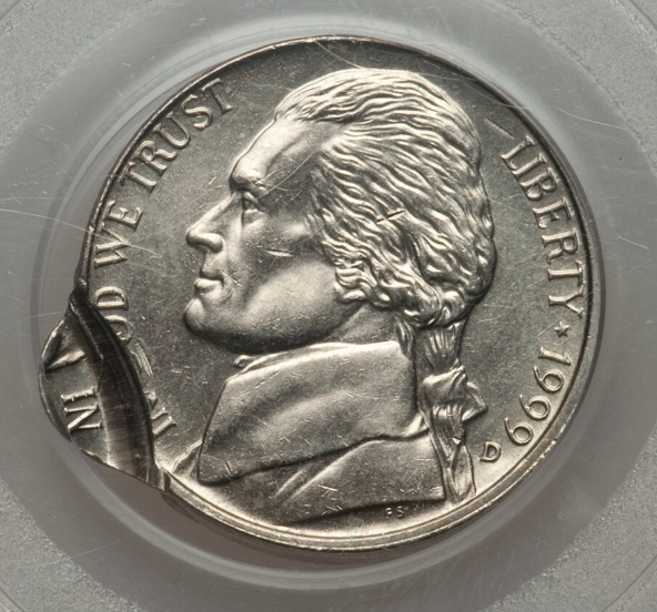 1999 Jefferson nickel double strike error showing two overlapping sets of design elements from two separate strikes